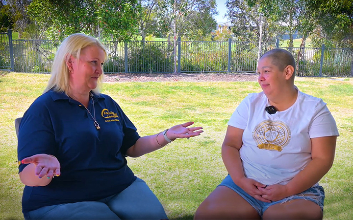 Family of League National Wellbeing Manager, Roxanne Moates, chats to a wellbeing recipient.